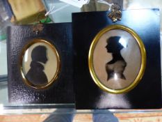 TWO OVAL SILHOUETTES ON GLASS, ONE LABELLED VERSO MRS THOS HYAM, THE OTHER MR C. DAWSON