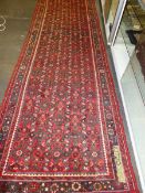 A PERSIAN HAMADAN RUNNER 380 x 106cm