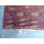 AN ANTIQUE TURKISH PRAYER RUG OF CLASSIC DESIGN 146 x 112cm. TOGETHER WITH A TEKKE BOKHARA RUG 177