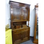 A LARGE 19th C. FRENCH OAK TWO PART SIDE CABINET. W 118 X D 50 X H 227cms.