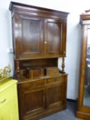 A LARGE 19th C. FRENCH OAK TWO PART SIDE CABINET. W 118 X D 50 X H 227cms.