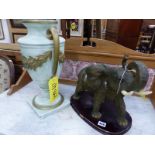 A LARGE ELEPHANT ORNAMENT AND A TABLE LAMP BASE.