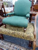 A GREEN DAMASK UPHOLSTERED VICTORIAN NURSING CHAIR ON BALUSTER LEGS TOGETHER WITH AN OTTOMAN STOOL