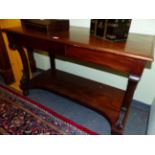 A 19th C. MAHOGANY CONSUL TABLE WITH SHAPED SUPPORTS AND PLATFORM UNDER TIER. W 122 X D 59 X H