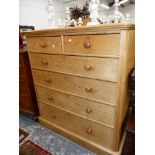 AN ASH CHEST OF TWO SHORT AND FOUR GRADED LONG DRAWERS ON PLINTH FOOT. W 123 x D 58 x H 133cms.