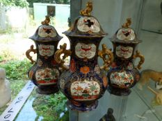 ATTRIBUTED TO MASONS IRONSTONE, A GARNITURE OF THREE 2 HANDLED POTPOURRI JARS AND COVERS.