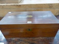 A VICTORIAN ROSEWOOD WRITING SLOPE INLAID WITH BRASS ESCUTCHEONS, THE INTERIOR WITH TWO INKWELLS. W