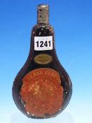A JOHN HALL AND SON BLACKENED METAL POWDER FLASK BEARING BRASS AND PAPER LABELS INSCRIBED THE