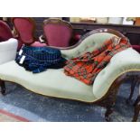 A VICTORIANMAHOGANY BUTTON BACKED SHOW FRAME CHAISE LONGUE UPHOLSTERED IN PALE GREY VELVET, THE CABR