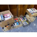 A LARGE QUANTITY OF MILITARY RELATED BOOKS AND NOVELS.