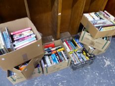 A LARGE QUANTITY OF MILITARY RELATED BOOKS AND NOVELS.