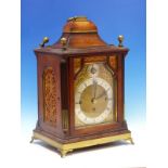A MAHOGANY CASED MANTEL CLOCK, THE PLATFORM ESCAPEMENT MOVEMENT STRIKING ON A COILED ROD AND CHIMING