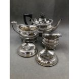 A HALLMARKED SILVER THREE PIECE BACHELORS TEA SET DATED 1905, 06 AND 1912, FOR GEORGE NATHAN &