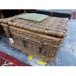 A VINTAGE LINEN BASKET WITH HANDLES WOVEN INTO THE NARROW SIDES. W 77cms. TOGETHER WITH A QTY OF LIN