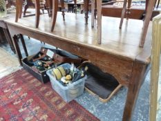 A COUNTRY MADE OAK SIX CLEATED PLANK TOP TABLE WITH BRACKETS JOINING THE APRON TO THE CANTED SQUARE