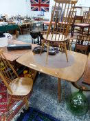 AN ERCOL TEAK ROUNDED SQUARE EXTENDING DINING TABLE AND THREE CHAIRS, THE TABLE. W 125 x D 112 x H