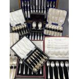 AN EDWARDIAN HALLMARKED SILVER AND MOTHER OF PEARL CASED SET OF CUTLERY FOR TWELVE PLACES, DATED