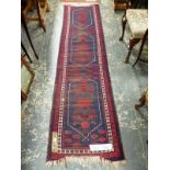 THREE ORIENTAL RUGS, A TURKISH RUNNER 270 x 69cm, A BELOUCH PRAYER RUG 148 x 86cm AND A