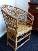 A PAIR OF CHINESE RATTAN TUB ARMCHAIRS, THE BACKS WITH CENTRAL SHOU ROUNDELS FLANKED BY CASH