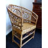 A PAIR OF CHINESE RATTAN TUB ARMCHAIRS, THE BACKS WITH CENTRAL SHOU ROUNDELS FLANKED BY CASH