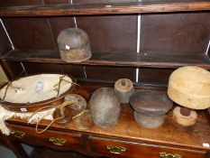 FOUR VINTAGE MILLINERY HATTERS BLOCKS TOGETHER WITH AN ARD DECO RISE AND FALL LIGHT SHADE.