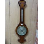 SATTELY AND SONS. TETBURY, A VICTORIAN OAK CASED WHEEL BAROMETER WITH ALCOHOL THERMOMETER ABOVE THE