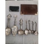 A SMALL COLLECTION OF DUTCH SILVER SPOONS, A GOLD MOUNTED LEATHER WALLET AND A SILVER EXAMPLE