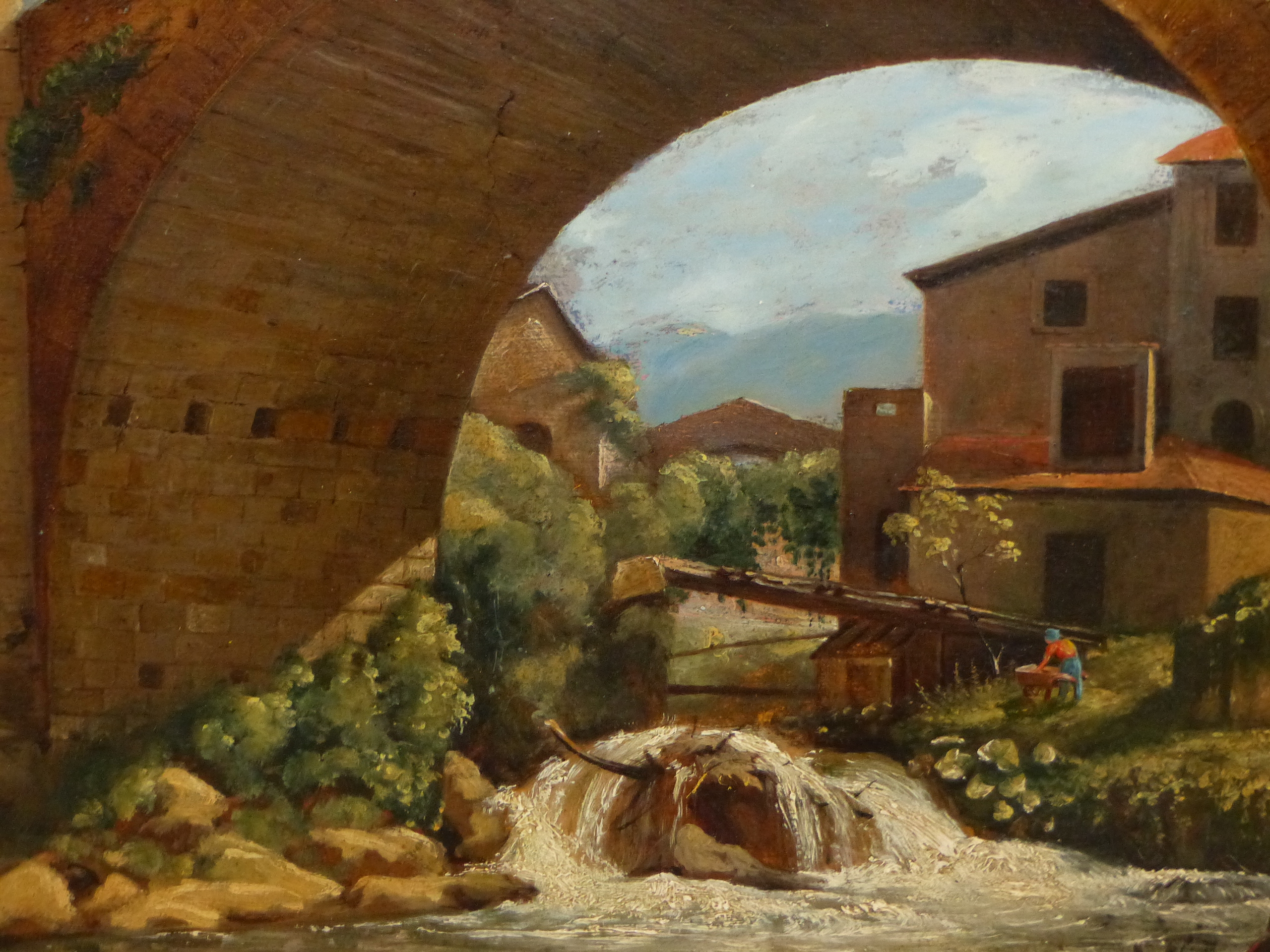 19th / 20th C CONTINENTAL SCHOOL. A NORTH ITALIAN RIVERSIDE VILLAGE, INDISTINCTLY INITIALLED OIL