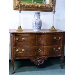 A 18th C. FRENCH WALNUT CHEST THE TWO ARBALETTE FRONTED DRAWERS ABOVE CENTRAL SHELL CARVED ON THE A
