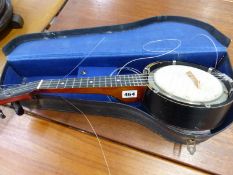 A VINTAGE UKULELE BANJO AND CASE.