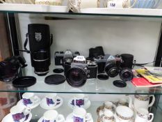 PENTAX, AND EXAKTA CAMERAS AND VARIOUS CAMERA LENSES AND MANUALS.