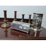 AN ART NOUVEAU BOTTLE STAND, 2 PAIRS OF SILVER PLATED CANDLESTICK AND A PLATED DESK STAND.