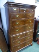 AN GEORGIAN AND LATER ANTIQUE HERRING BONE CROSS BANDED WALNUT CHEST ON CHEST, THE THREE DRAWERS