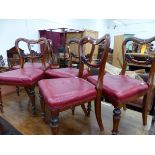 A SET OF FIVE VICTORIAN MAHOGANY BALLOON BACK CHAIRS WITH RED SEATS ABOVE TAPERING CYLINDRICAL FRONT