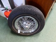 A JAGUAR E-TYPE WIRE WHEEL.