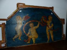 A PINE PANEL PAINTED WITH A PUTTO TRUMPETER WITH TWO FURTHER TWO PUTTI HOLDING A RED GARLAND AGAINST