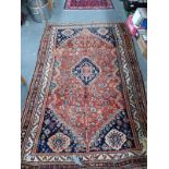 AN ANTIQUE PERSIAN SHIRAZ RUG 247 x 154cm