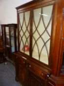 A GEORGIAN STYLE MAHOGANY TWO PART BOOK CASE. W 155 X D 43 X H 207CMS.