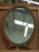 A 1920's DECORATIVE OVAL MIRROR H 57cm