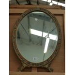 A 1920's DECORATIVE OVAL MIRROR H 57cm