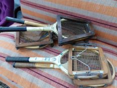 SIX VINTAGE TENNIS RACKETS IN THEIR PRESSES, TO INCLUDE MODELS AS USED BY EVONNE GOOLAGONG AND