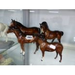 THREE BESWICK HORSE FIGURES AND ONE OTHER (4).