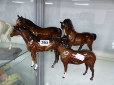 THREE BESWICK HORSE FIGURES AND ONE OTHER (4).