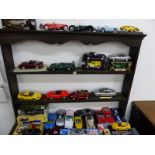 A SMALL COLLECTION OF LARGE DIE CAST AND OTHER VEHICLES TO INCLUDE CORGI, BURAGO, MAISTO AND OTHERS.