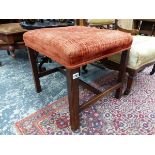 A GEORGIAN MAHOGANY STOOL, THE TERRACOTTA UPHOLSTERED SEAT ON CHANNELED SQUARE LEGS