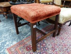 A GEORGIAN MAHOGANY STOOL, THE TERRACOTTA UPHOLSTERED SEAT ON CHANNELED SQUARE LEGS