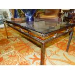 A SMOKEY GLASS TOPPED BRASS COFFEE TABLE WITH TWO WINE TABLE EN SUITE