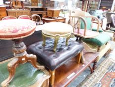 A VICTORIAN MAHOGANY PIANO STOOL, THE CIRCULAT NEEDLE WORKED SEAT ADJUSTABLE ON THE FOLIATE CARVED