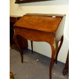 A FRENCH WALNUT AND INLAID WRITING BUREAU ON SLENDER CABRIOLE LEGS. W 67 X D 44 X H 92cms.