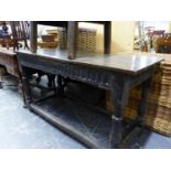 AN ANTIQUE OAK TRESTLE TABLE WITH FLUTED APRON ABOVE BALUSTER LEGS. W 148 x D 62 x H81cms.